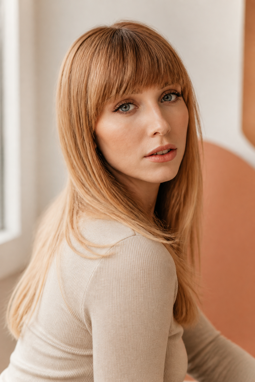 fall hair colors for fair skin and blue eyes: strawberry blonde in an original editorial composition