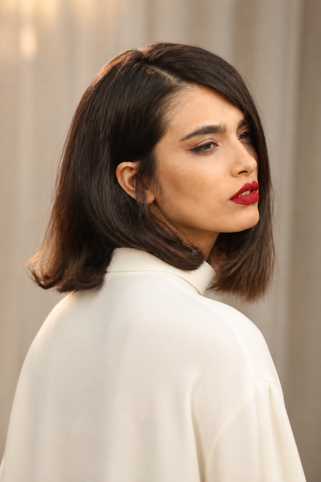fall old money bob hairstyles: espresso bob in an original editorial composition
