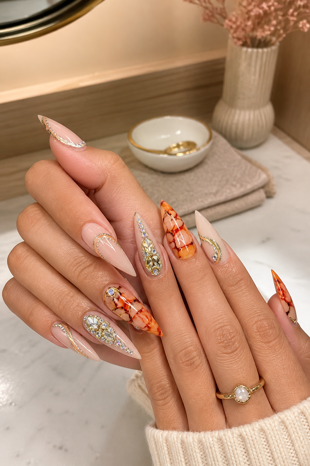 fiery amber marble nails with crystal detail
