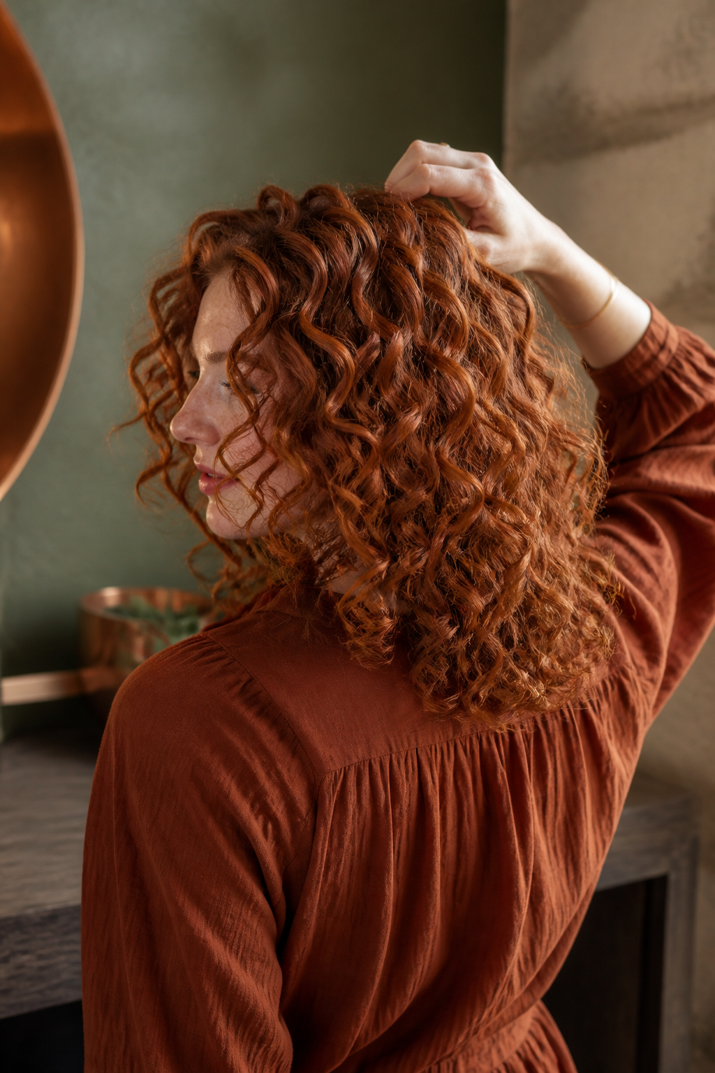 Copper penny color on shoulder-length curls