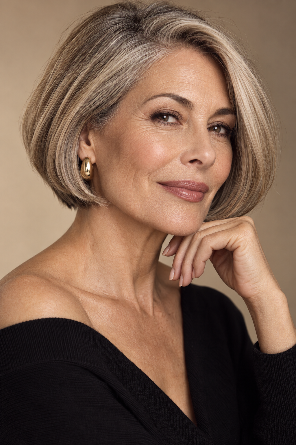 short stacked bob haircuts for women over 50: classic chin-length stacked bob with smooth layers