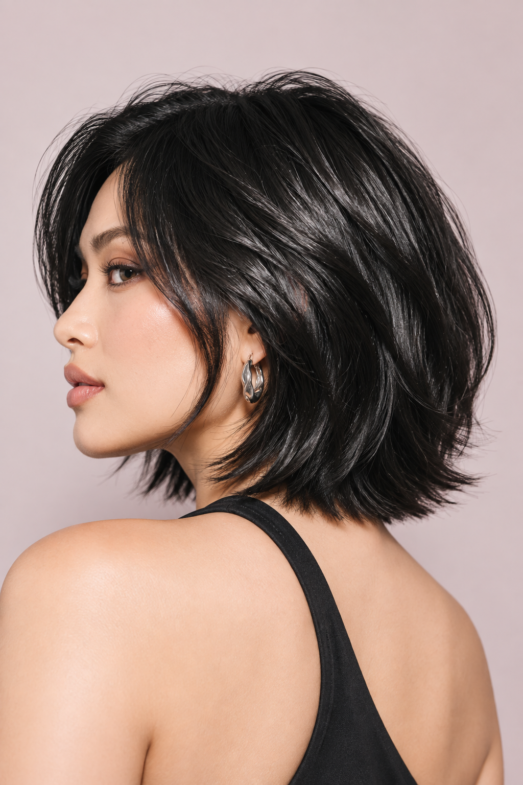 short ear length hairstyles: glossy black bob