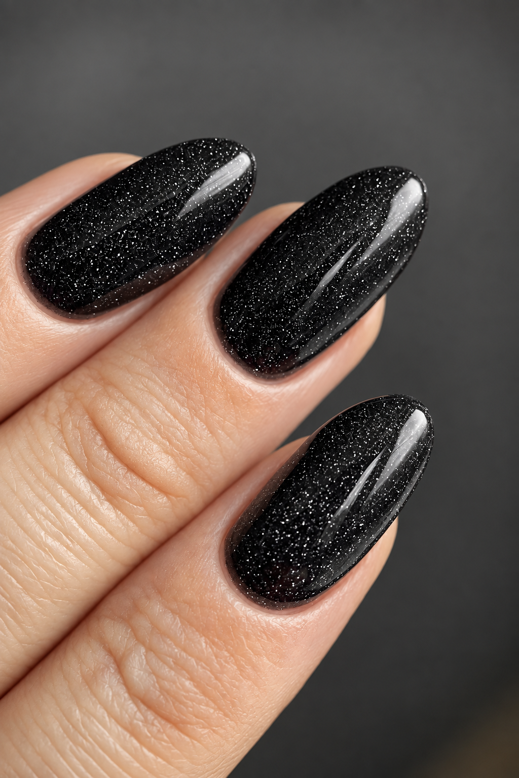 black nail ideas for mother of the groom: black and gold foil