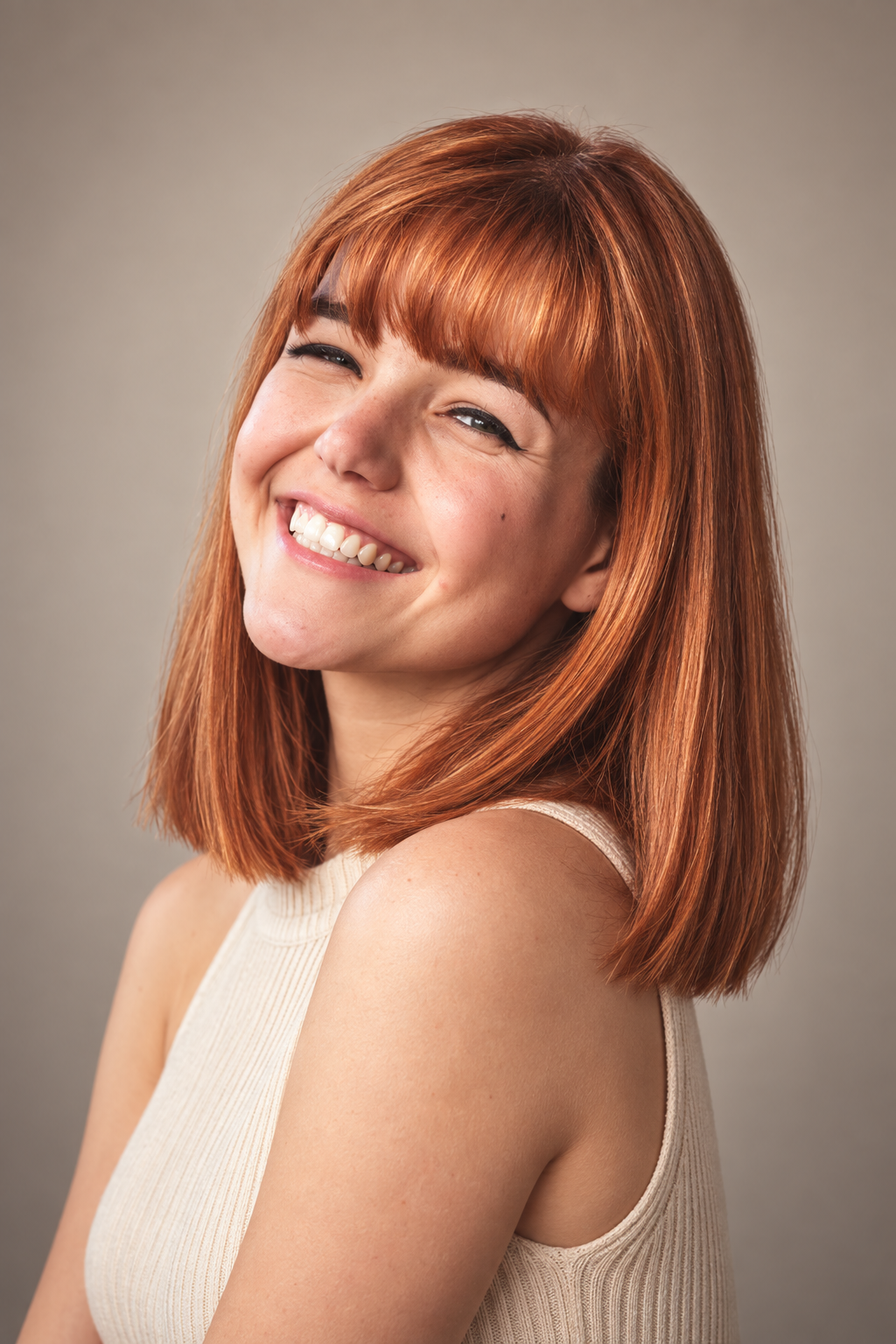 lob with bangs: sleek copper lob with full bangs