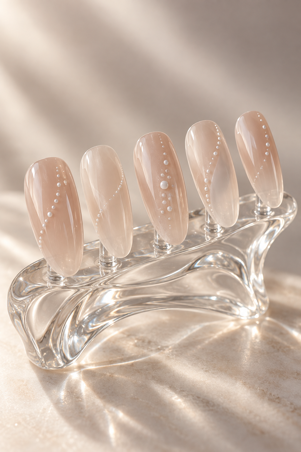 subtle nail ideas: sheer nails with white dots