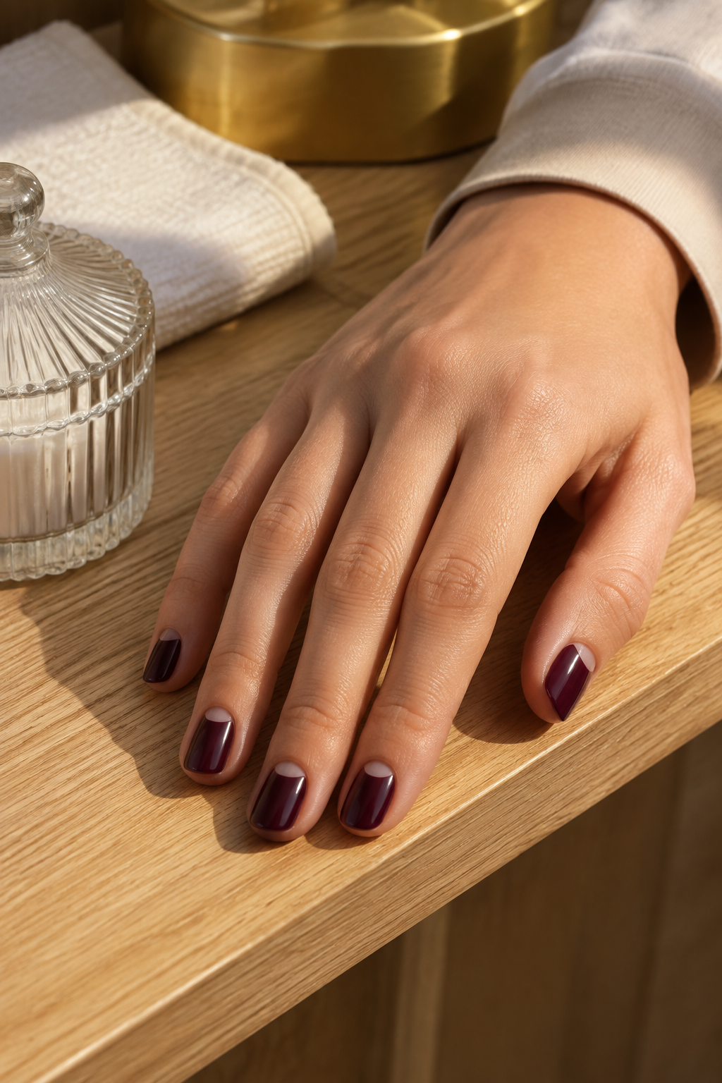 nail designs for professionals with a glossy burgundy finish