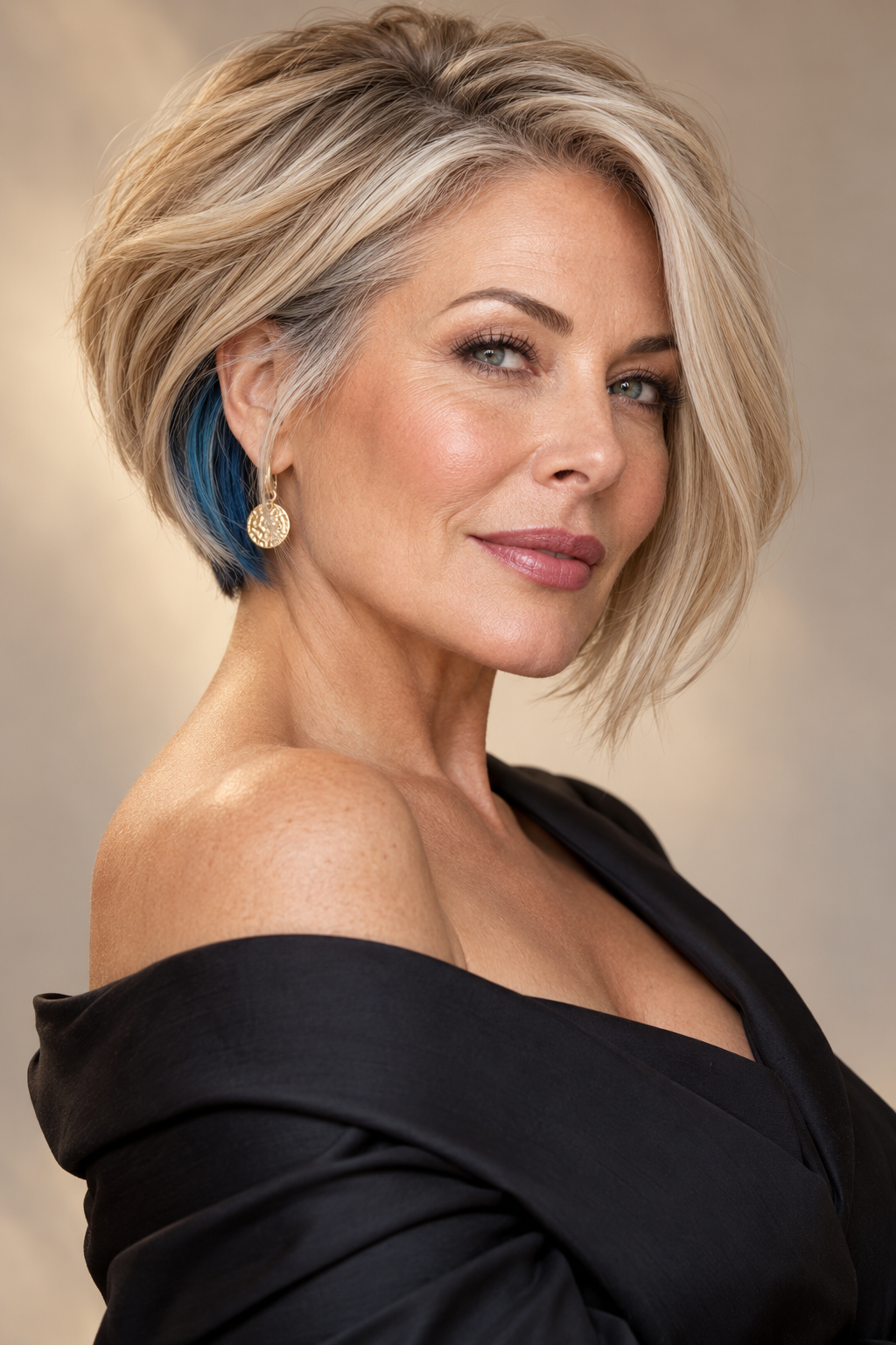 golden brunette hair: blonde stacked bob with hidden blue undercut