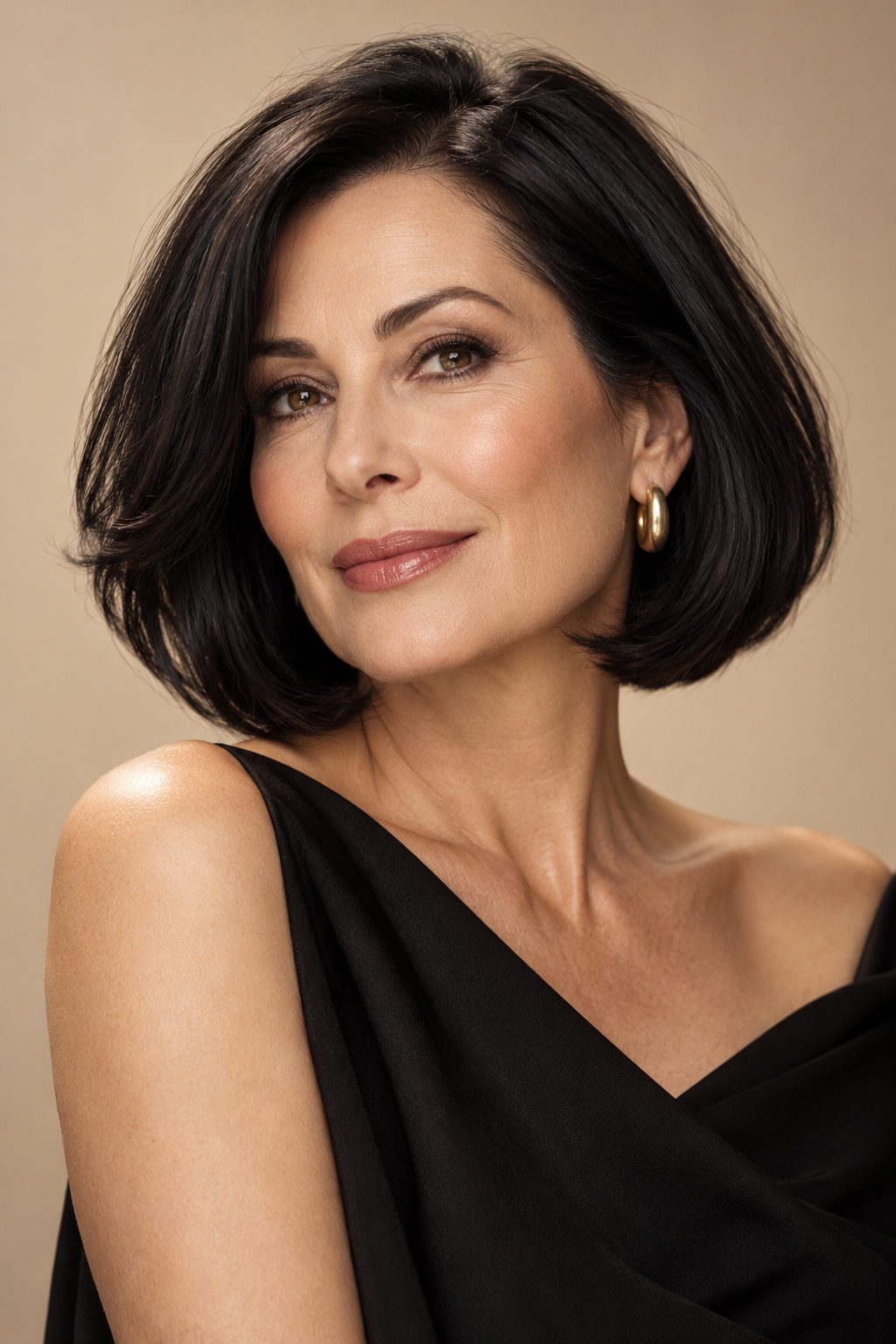 golden brunette hair: sleek black bob with curled under layers