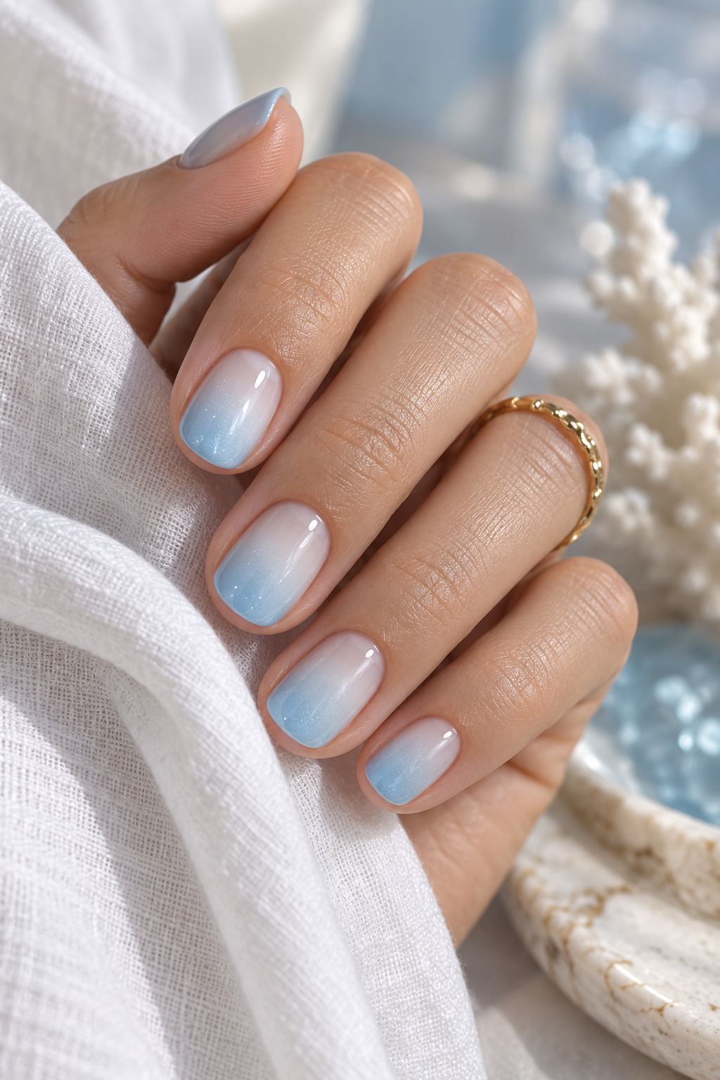 short nail ideas for summer: icy blue ombre