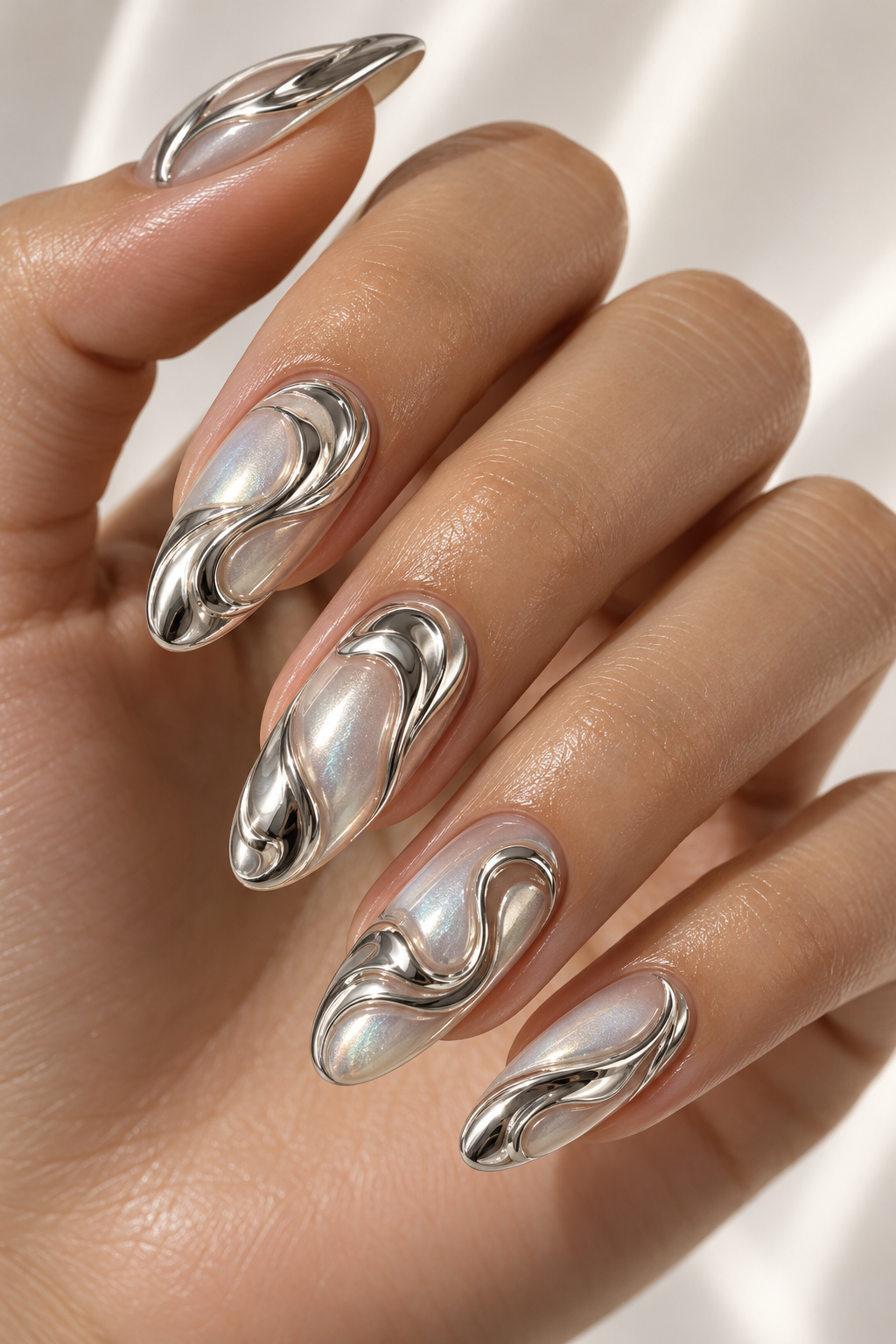 chrome nail ideas sculpted chrome swirls